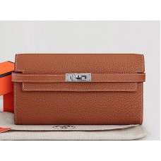 Portefeuille Kelly long Hermès Dogon Togo en cuir original camel