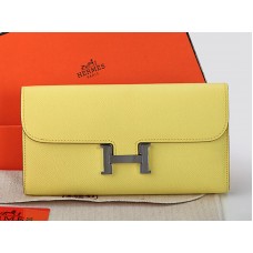 Portefeuille long Constance en cuir de veau Epsom jaune d'Hermès
