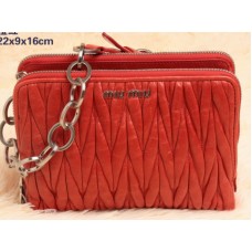 Sac bandoulière mini Miu Miu en cuir matelassé glacé orange