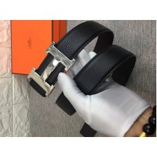 Boucle de ceinture Hermès H argentée brillante et bracelet réversible en cuir noir