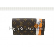 Portefeuille Louis Vuitton Monogram Groom avec poche zippée orange